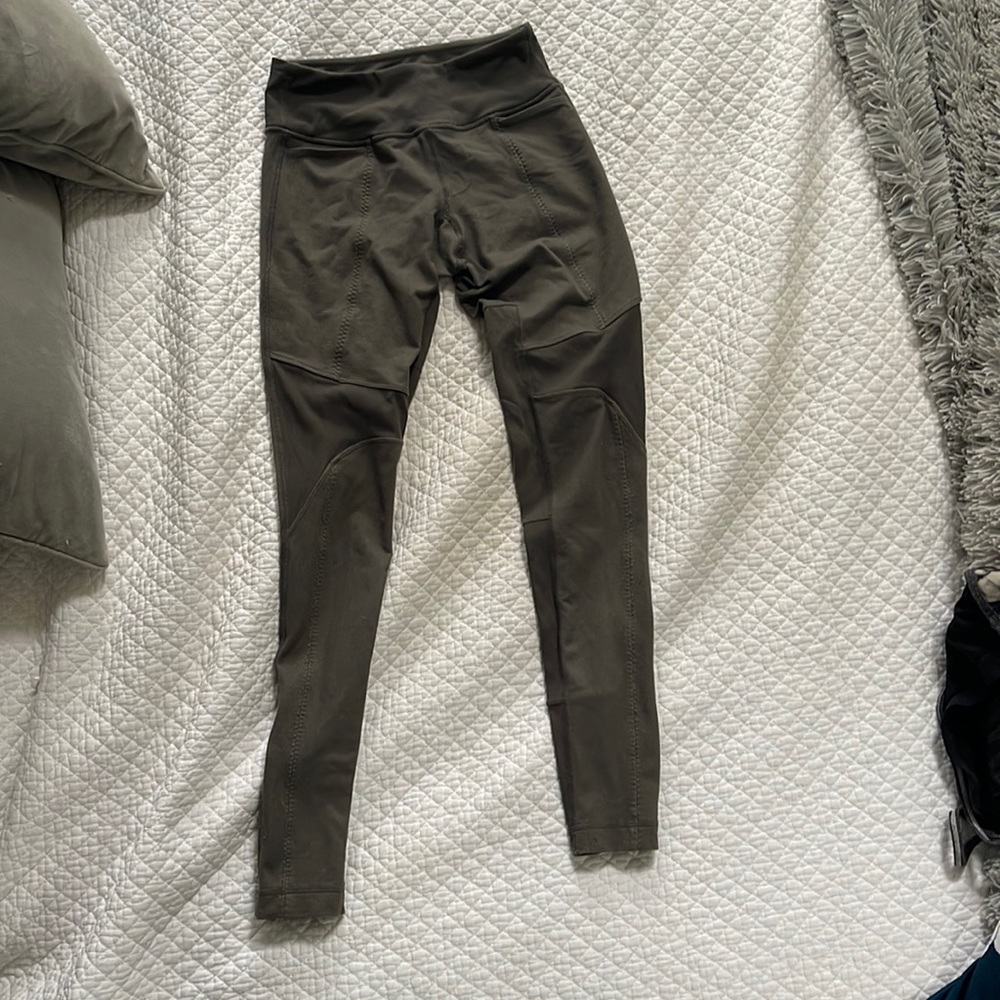 Lululemon leggings. Pretty olive green color. Interesting detail